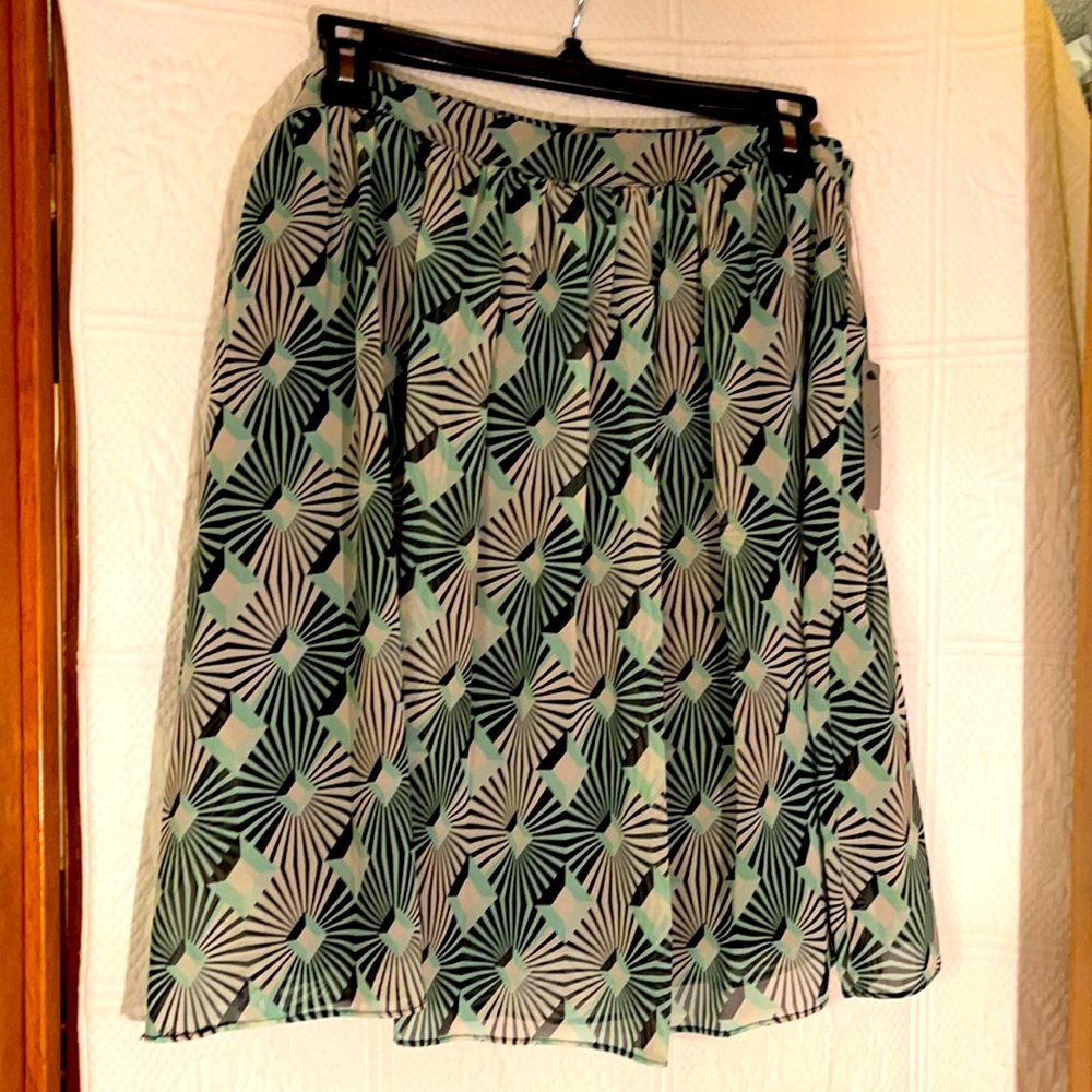 Worthington Blue Diamond above knee skirt. Hemmed and lined in black.